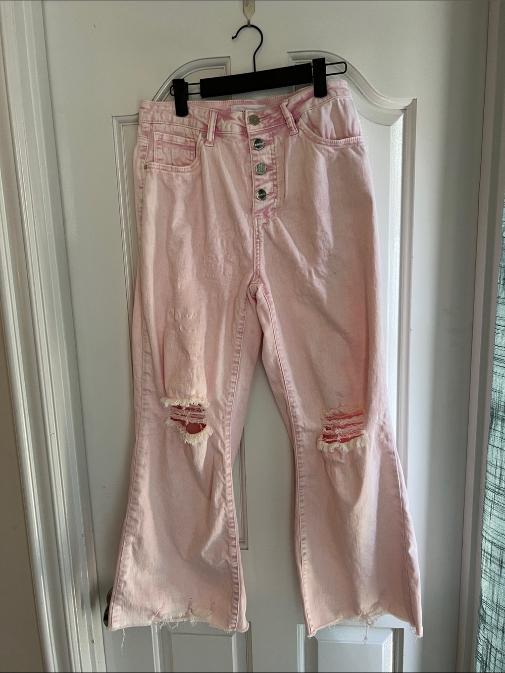 High-Rise Pink Flare Jeans with Distressed Knees